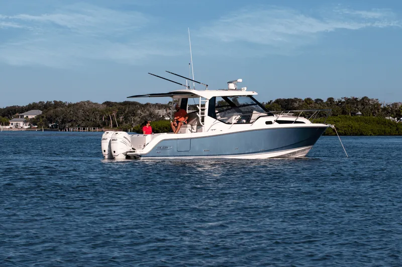 Slide: The Image of Boston Whaler 325 Conquest 2027 - 32