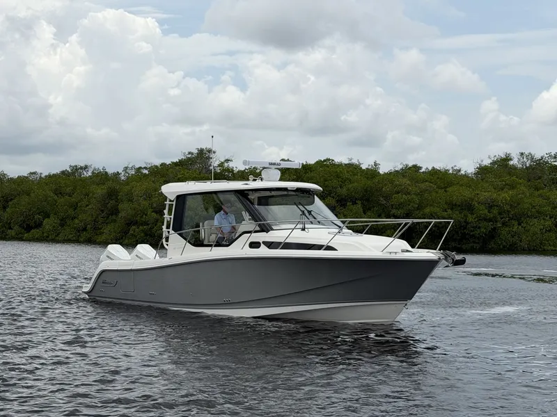 Slide: The Image of Boston Whaler 325 Conquest 2027 - 1
