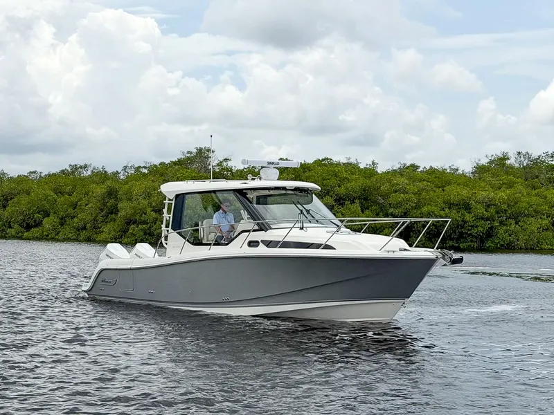 Slide: The Image of Boston Whaler 325 Conquest 2027 - 1