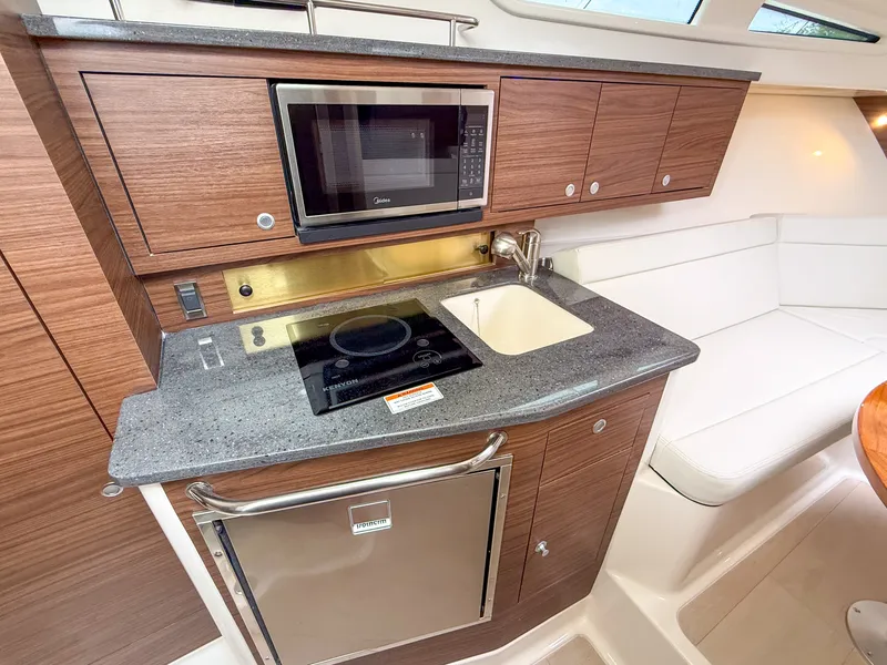 Slide: The Image of Boston Whaler 325 Conquest 2027 - 20