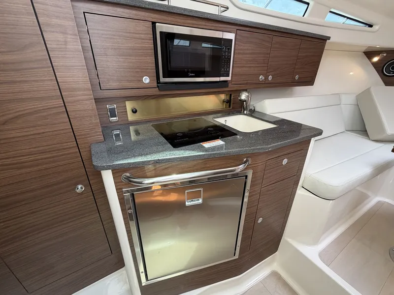 Slide: The Image of Boston Whaler 325 Conquest 2027 - 20