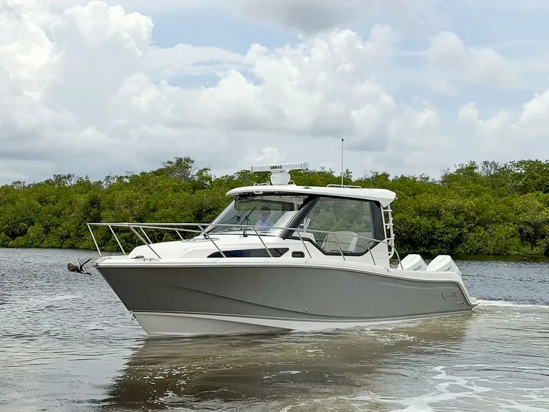 Slide: The Image of Boston Whaler 325 Conquest 2027 - 3