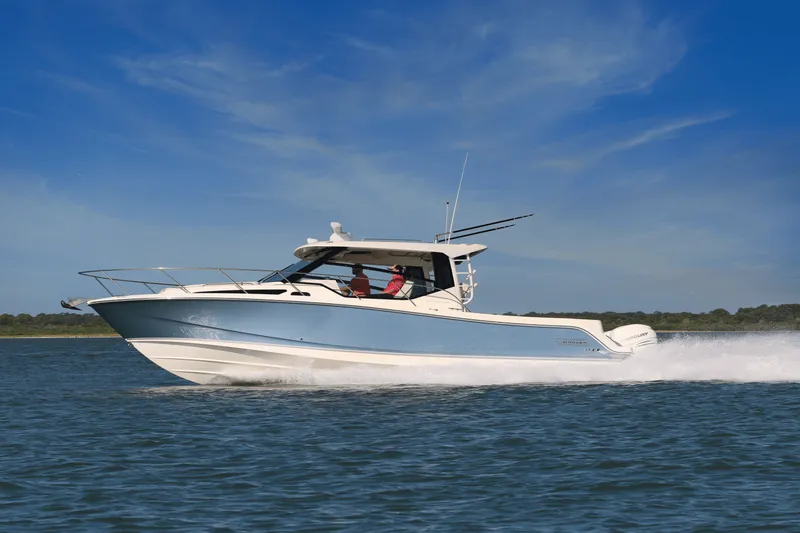 Slide: The Image of Boston Whaler 325 Conquest 2027 - 30