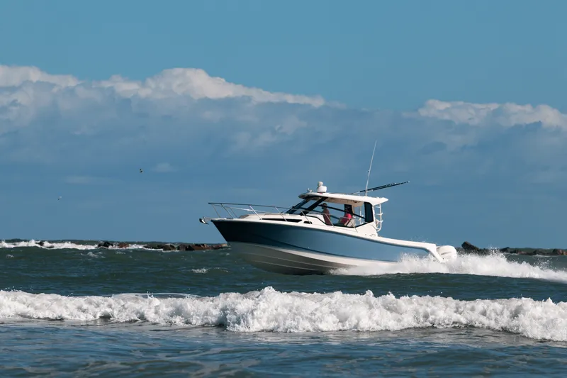 Slide: The Image of Boston Whaler 325 Conquest 2027 - 34