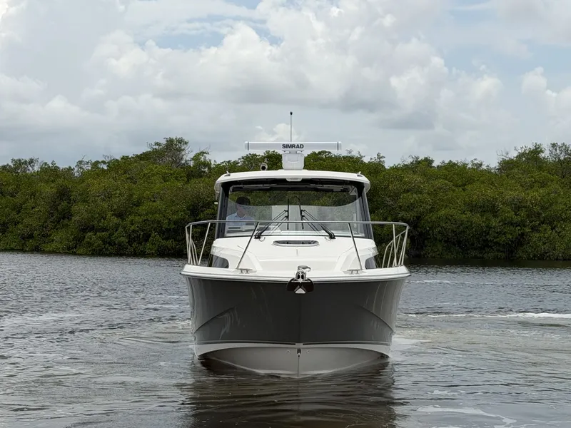 Slide: The Image of Boston Whaler 325 Conquest 2027 - 2
