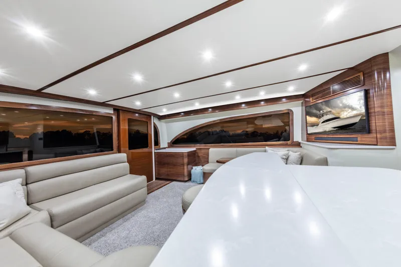 Slide: The Image of Luxurious interior of 2024 Albemarle Spencer Edition yacht with modern seating and elegant design. - 10