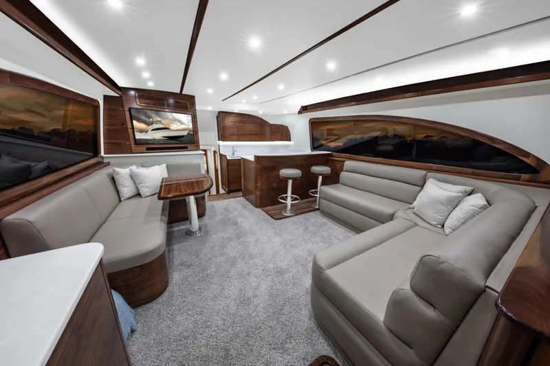 Slide: The Image of Luxurious interior of the 2024 Albemarle Spencer Edition yacht with modern seating and elegant design. - 7