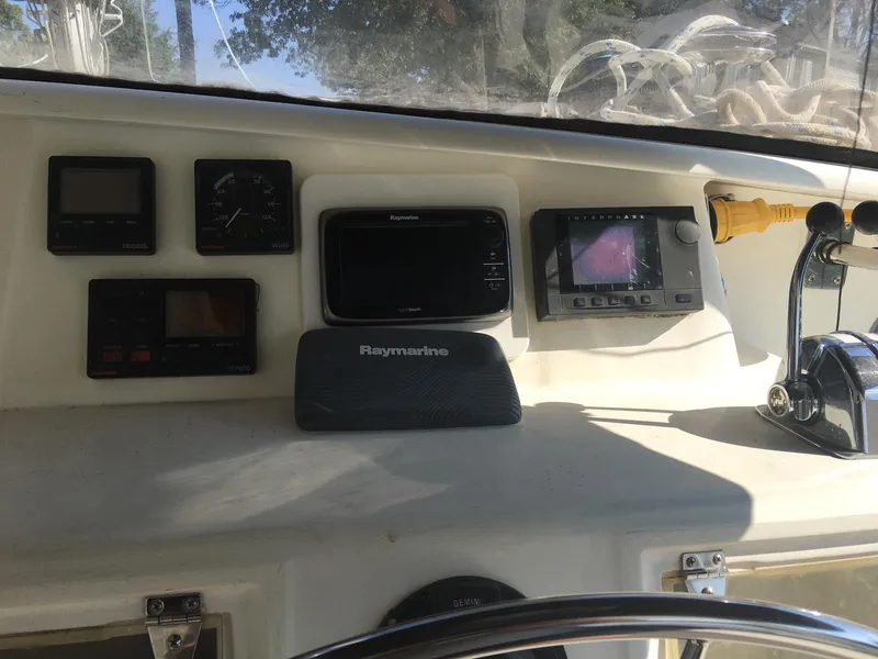 Slide: The Image of Control panel of a 1996 Voyage Yachts 470 with navigation equipment. - 6