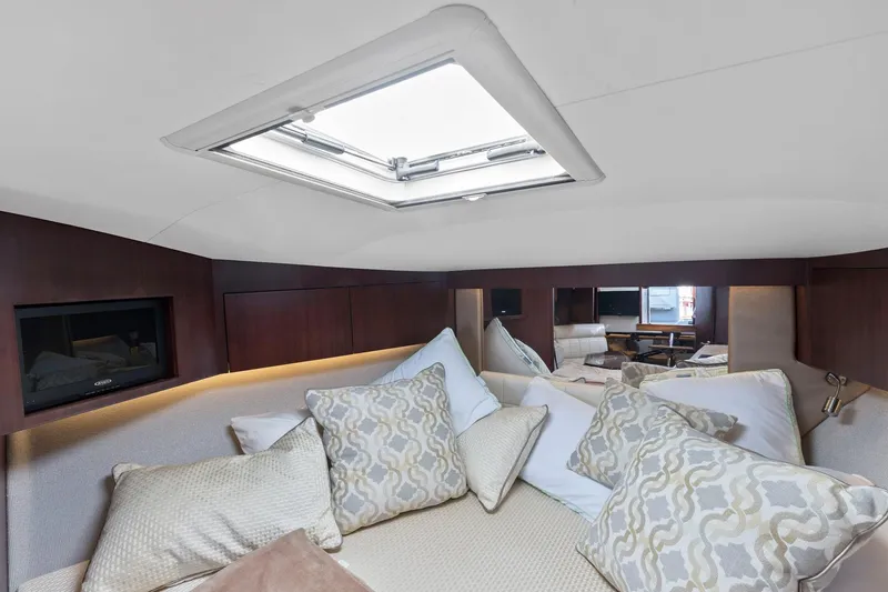 Slide: The Image of Luxurious cabin interior of 2017 Jupiter 41SB yacht with skylight and plush pillows. - 17