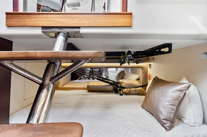 Slide: The Image of 2017 Jupiter 41SB cabin interior with wooden steps and cozy bedding. - 20