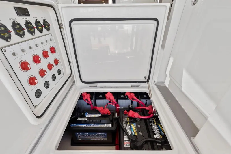 Slide: The Image of Battery compartment and control panel of a 2017 Jupiter 41SB boat. - 23