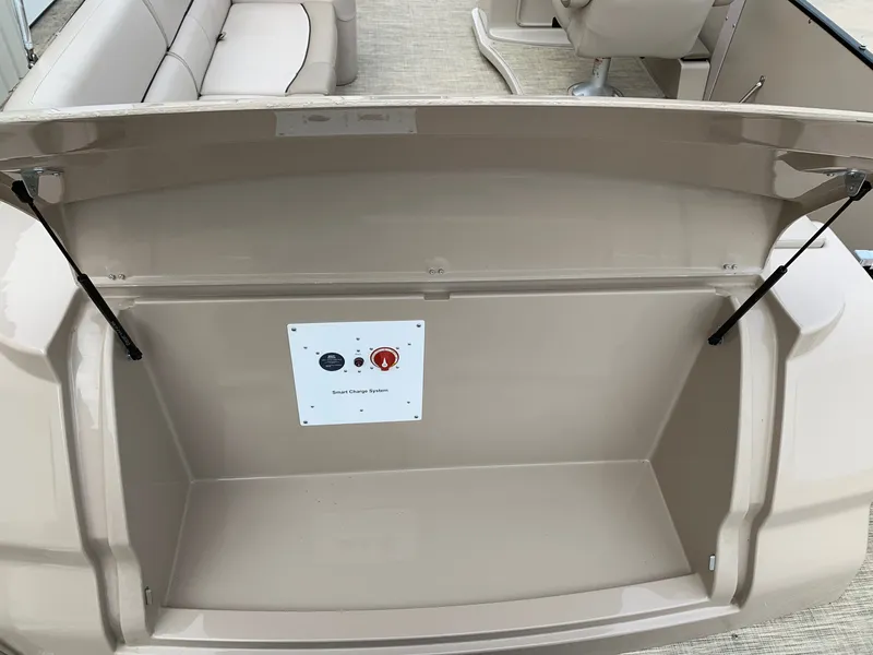 Slide: The Image of 2015 Avalon Ambassador boat storage compartment with smart charge system. - 11