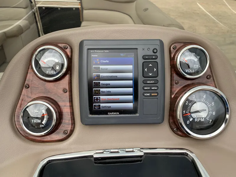 Slide: The Image of Dashboard of 2015 Avalon Ambassador boat with Garmin navigation system and gauges. - 19