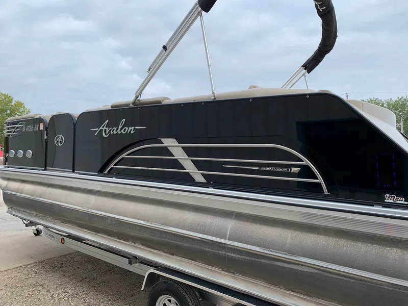 Slide: The Image of 2015 Avalon Ambassador Rear J Lounge pontoon boat on trailer. - 26