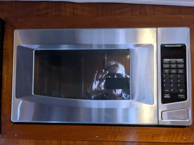 Slide: The Image of KitchenAid microwave in 1977 Hatteras 46 Convertible yacht interior. - 24