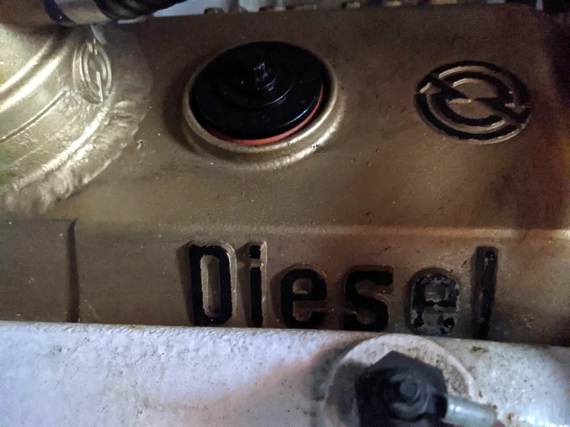Slide: The Image of Close-up of a diesel engine component from a 1977 Hatteras 46 Convertible boat. - 39