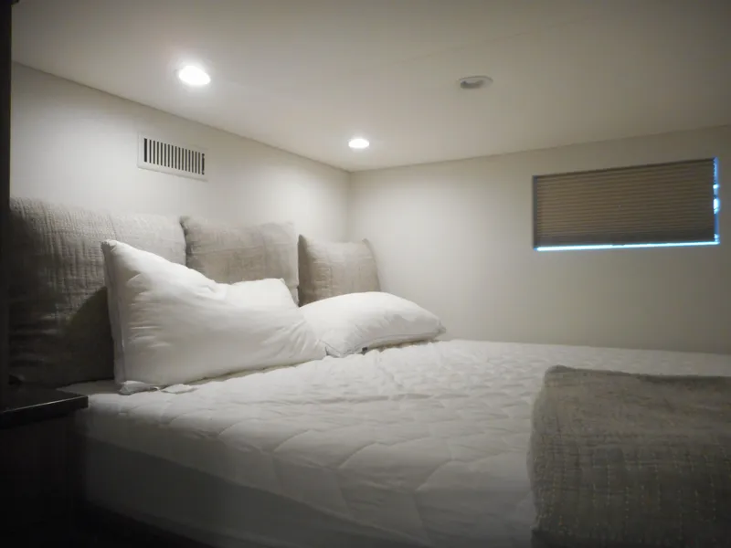 Slide: The Image of Cozy bedroom in Adonia Melody Share #12, 2021 model, featuring soft lighting and comfortable bedding. - 24