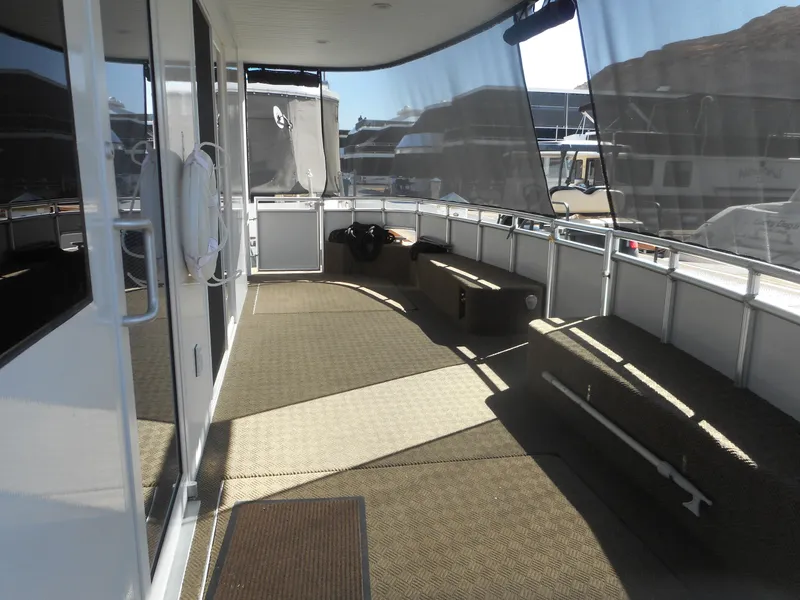 Slide: The Image of Spacious deck of 2021 Adonia Melody Share #12 houseboat with seating and shade. - 7