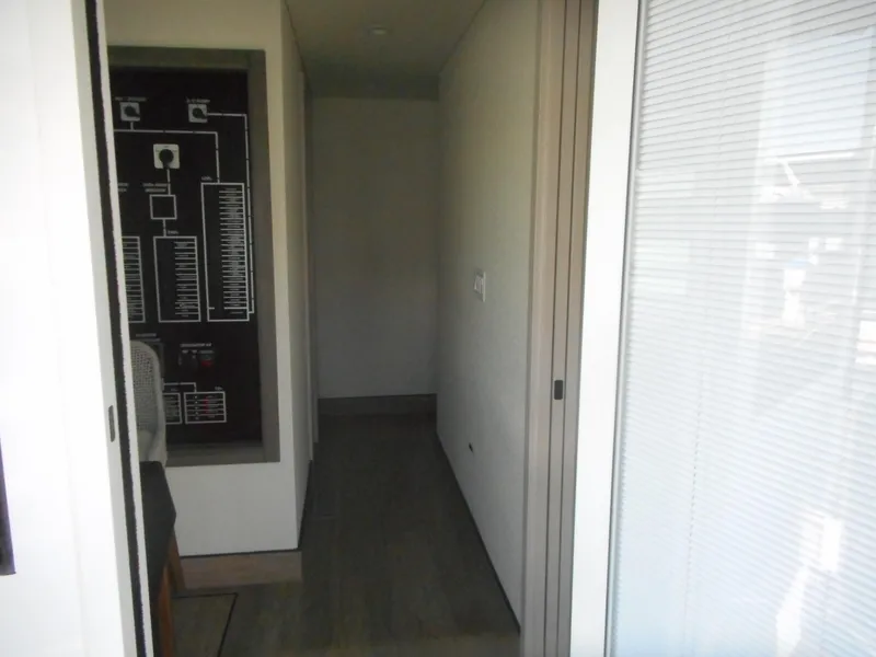 Slide: The Image of Hallway in Adonia Melody Share #12, 2021 model, featuring modern design and control panel. - 8