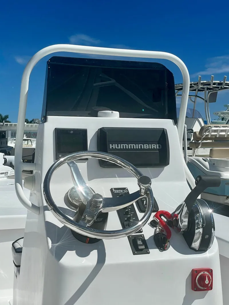 Slide: The Image of Steering console of 2025 Piranha Magro P180 boat with Humminbird electronics. - 11