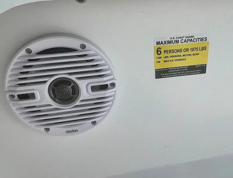 Slide: The Image of Speaker and capacity label on Piranha Magro P180 boat, 2025 model. - 16