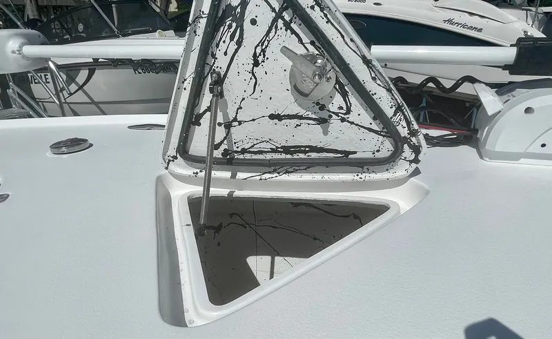 Slide: The Image of Open hatch on Piranha Magro P180 boat, 2025 model, with visible interior. - 18