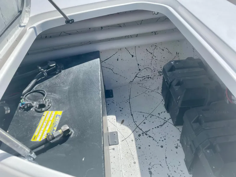 Slide: The Image of Interior view of 2025 Piranha Magro P180 boat storage compartment. - 20