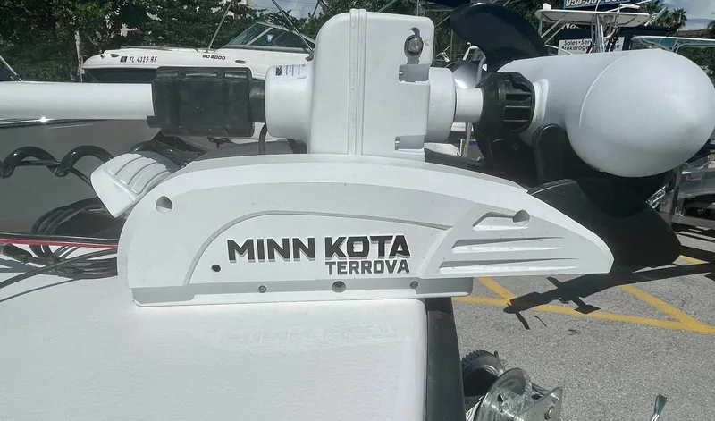 Slide: The Image of Minn Kota Terrova motor on Piranha Magro P180 boat, 2025 model, in a sunny outdoor setting. - 21