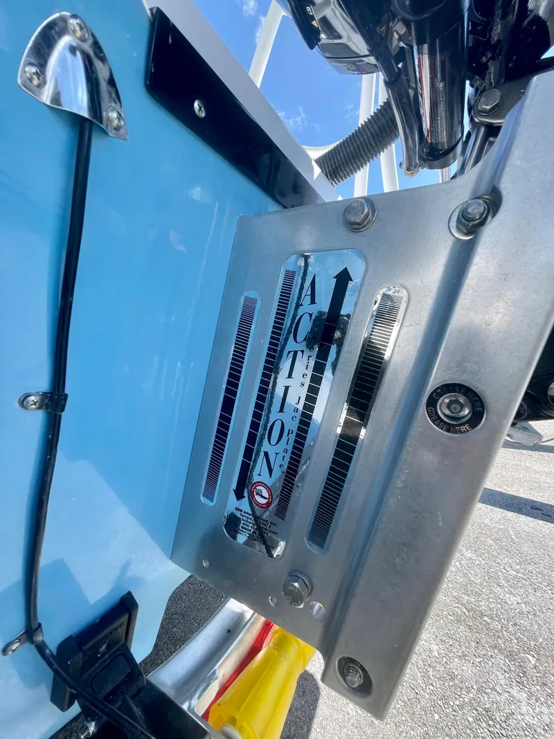 Slide: The Image of Close-up of 2025 Piranha Magro P180 boat component with "Action" branding. - 3