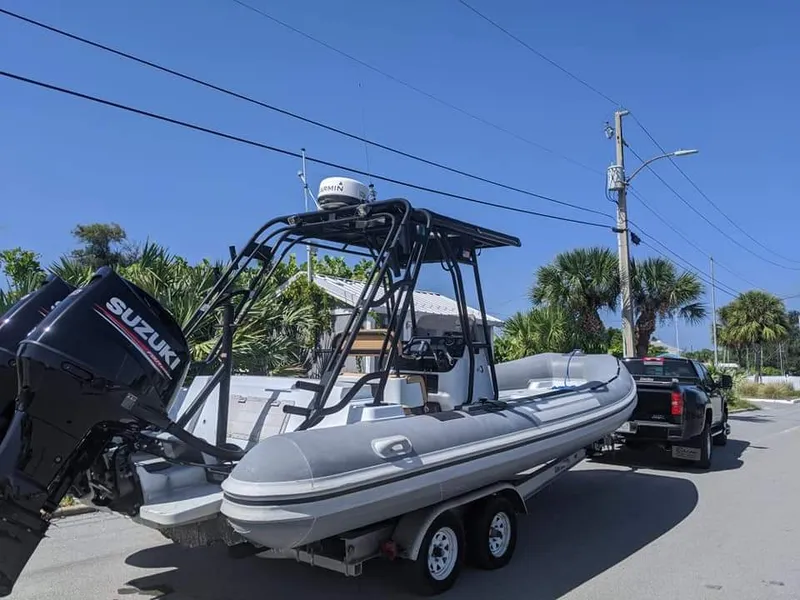 The Image of 2005 Nautica WIDE BODY boat parked in wooded area. - 0