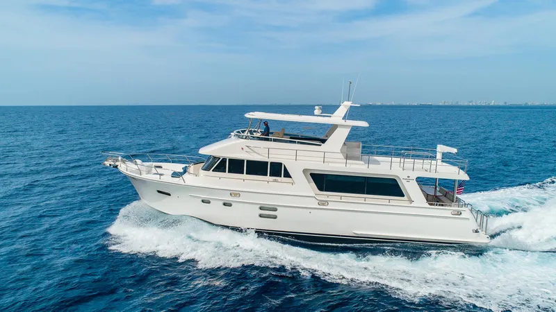 Slide: The Image of Hampton 680 ENDURANCE LRC 2027 yacht cruising on open sea. - 2