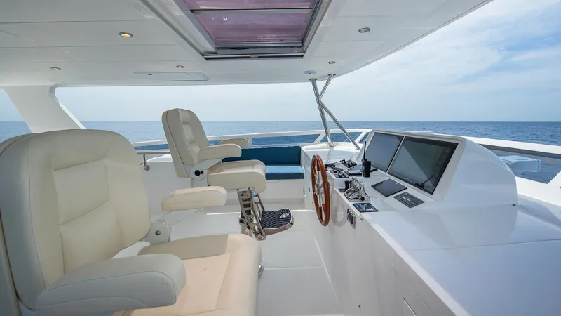 Slide: The Image of Hampton 680 ENDURANCE LRC 2027 yacht cockpit with luxurious seating and control console. - 29