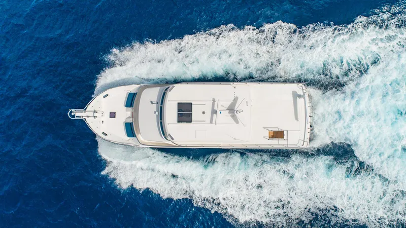 Slide: The Image of Aerial view of Hampton 680 ENDURANCE LRC yacht cruising in open sea, 2027 model. - 3