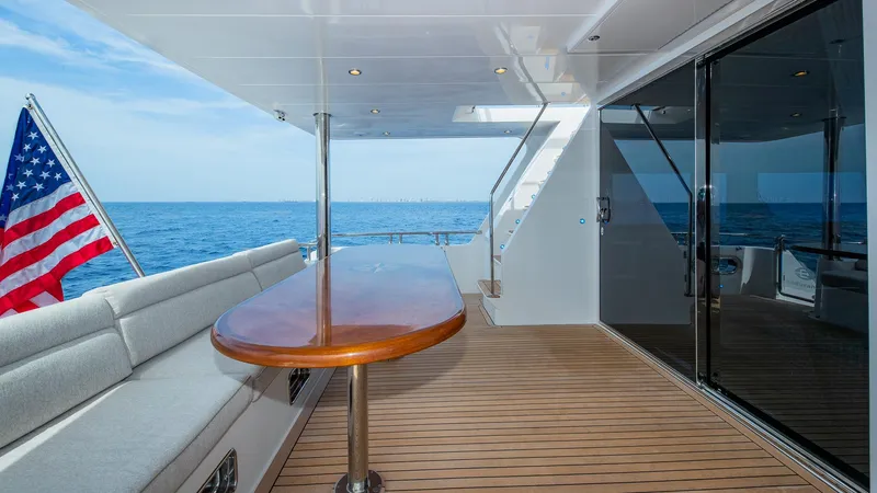 Slide: The Image of Hampton 680 ENDURANCE LRC 2027 yacht with deck and ocean view. - 8