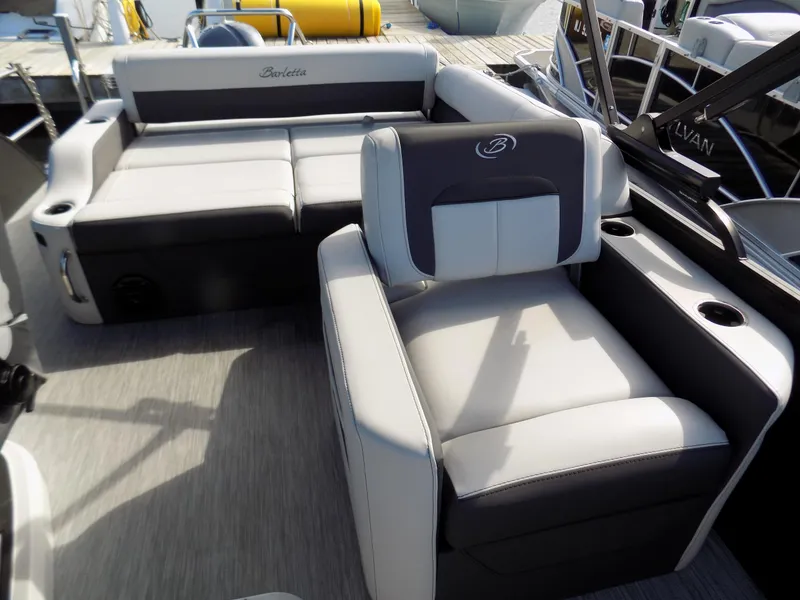 Slide: The Image of 2021 Barletta Corsa 23U boat interior with plush seating and modern design. - 7