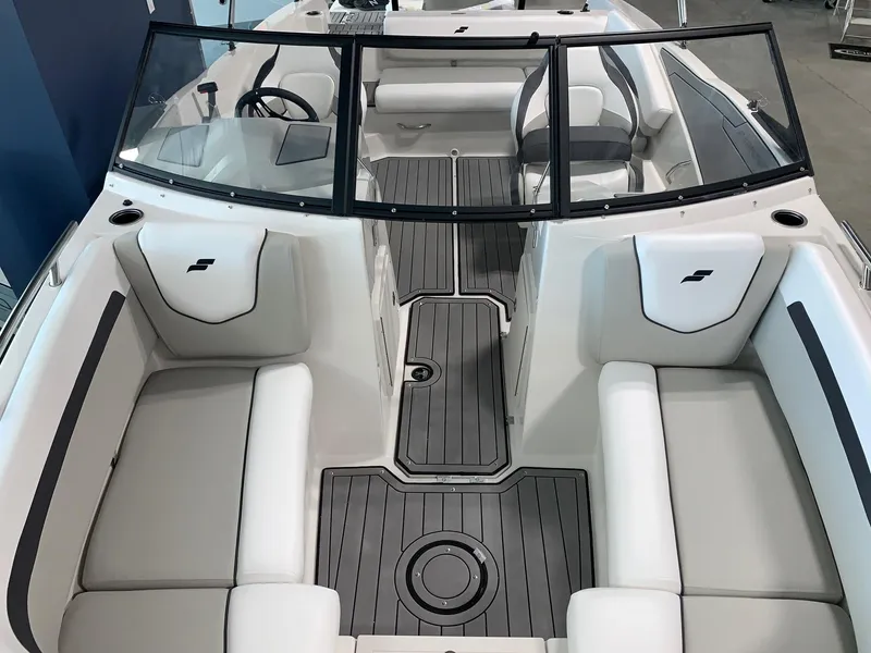Slide: The Image of 2024 Starcraft SVX 210 boat interior with spacious seating and modern design. - 12