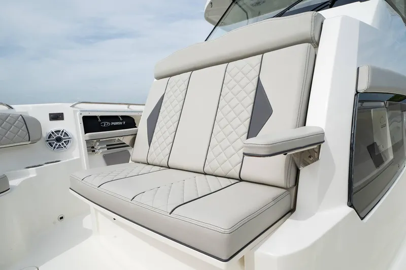 Slide: The Image of 2025 Pursuit S 358 boat with luxurious seating and modern design. - 6