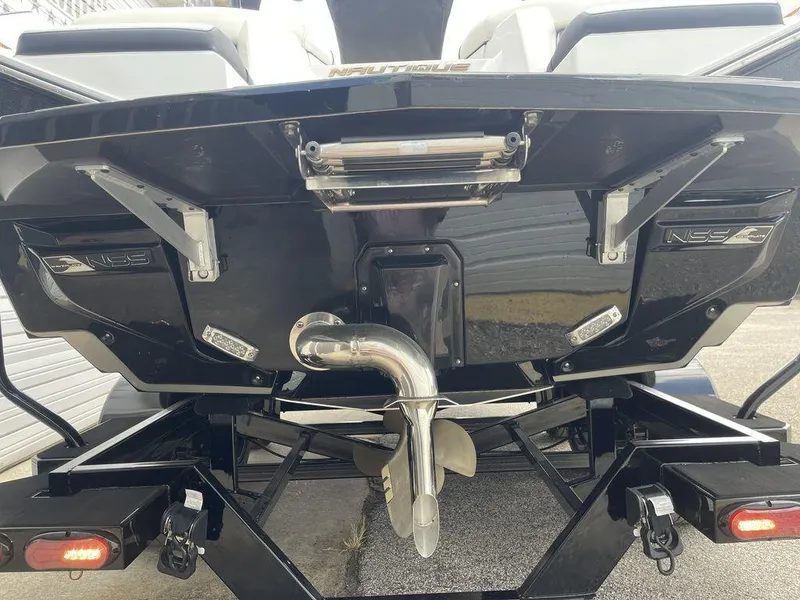 Slide: The Image of 2021 Nautique Super Air Nautique G23 boat stern with propeller and NSS system. - 3