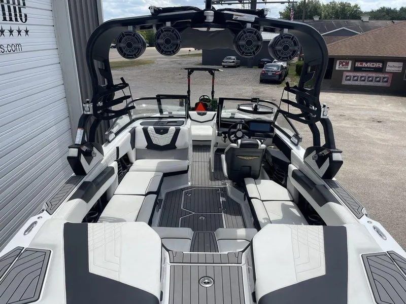 Slide: The Image of 2021 Nautique Super Air Nautique G23 interior with seating and advanced audio system. - 5