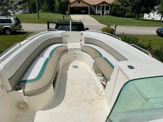 Slide: The Image of 1998 Bayliner 2659 Rendezvous boat with spacious seating area. - 7