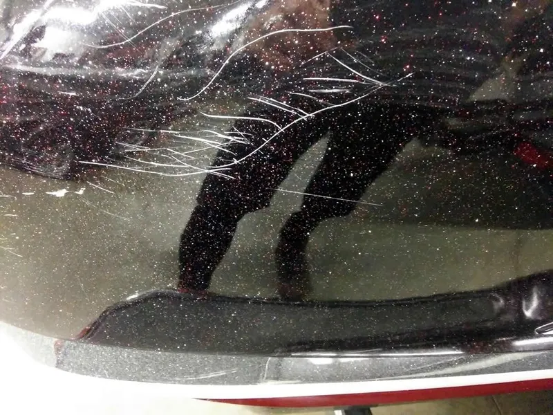 Slide: The Image of Scratches on black Nitro Z-8 DC 2015 boat hull. - 14
