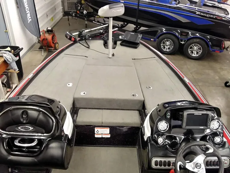 Slide: The Image of Interior view of a 2015 Nitro Z-8 DC boat with control console. - 15