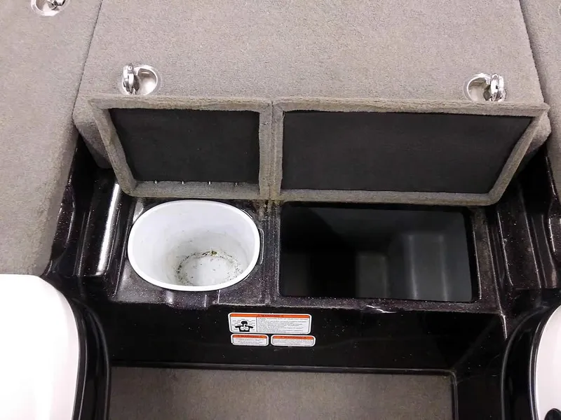 Slide: The Image of Interior of 2015 Nitro Z-8 DC boat with storage and cup holder. - 21
