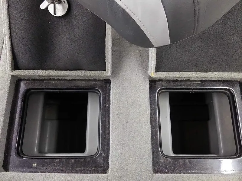 Slide: The Image of Interior of 2015 Nitro Z-8 DC with storage compartments. - 27