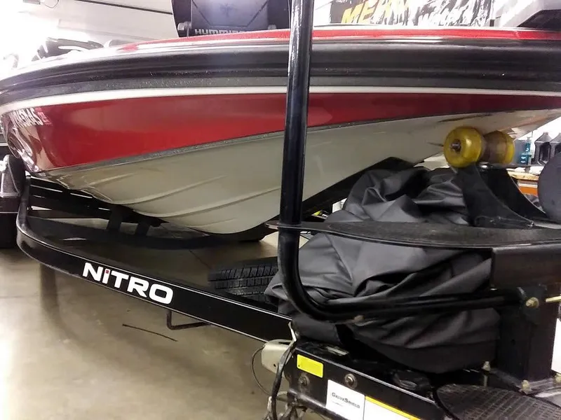 Slide: The Image of 2015 Nitro Z-8 DC boat on trailer in garage. - 8