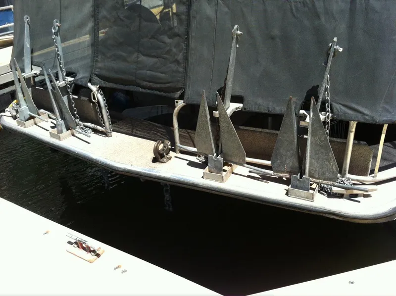 Slide: The Image of Anchors on the stern of a 1996 Stardust Cruisers houseboat. - 11