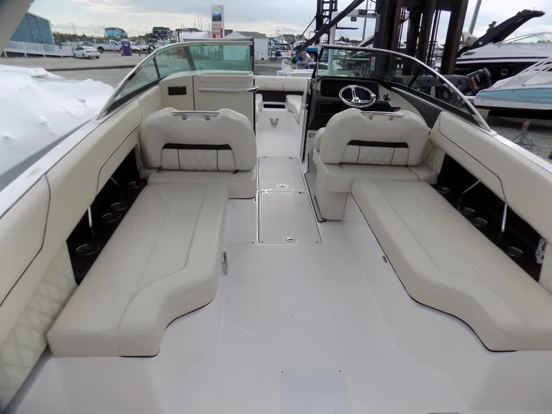 Slide: The Image of 2021 Regal LX6 boat interior with spacious seating and modern design. - 4
