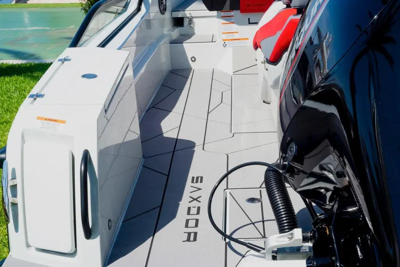 Slide: The Image of 2023 Saxdor 200 SPORT boat interior with modern design and seating. - 12