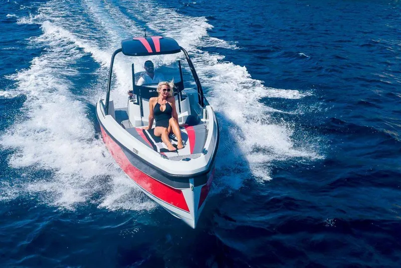 Slide: The Image of 2023 Saxdor 200 SPORT speedboat cruising on open water. - 22