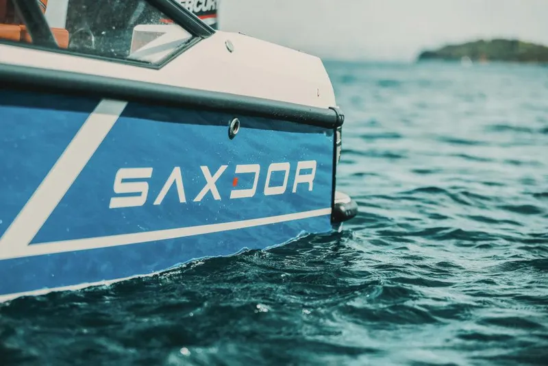 Slide: The Image of 2023 Saxdor 200 SPORT boat on water. - 7